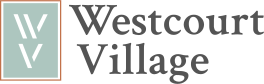 The image shows a logo with the text "Westcourt Village" with a green background.